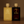 Two perfume bottles labeled '6 Aura' and '7 Aura' on a brown background